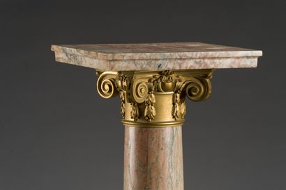 null 
74. Pair of Ionic columns forming saddles in green veined pink marble, the...