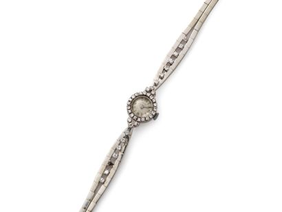 null 52. Ladies' watch bracelet in white gold (750/1000th). Mechanical movement.

The...