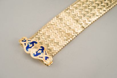 null 42. Bracelet ceinture en or jaune (750/1000e) partiellement émaillé et retenant...