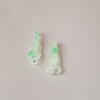null 105. Two jadeite pendants in the shape of crustaceans
