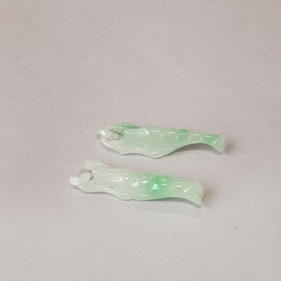 null 105. Two jadeite pendants in the shape of crustaceans