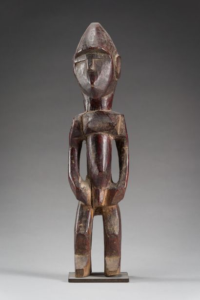 20. Male statuette presented standing naked,...