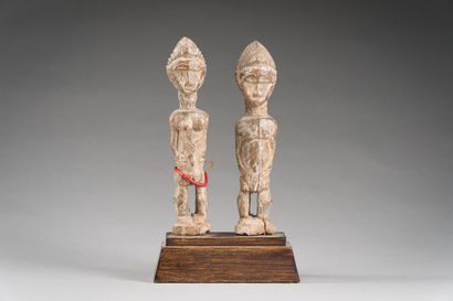 43. Pair of divination statuettes presenting...