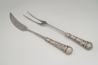 null Large cutlery for cutting meat in partially gilded metal and steel.

Argentina....