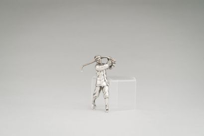 Statuette in the shape of a golf player in...