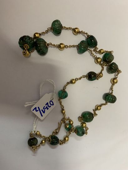 null 35. Necklace of balls and chains of gold 18K (750),

of emerald balls engraved...