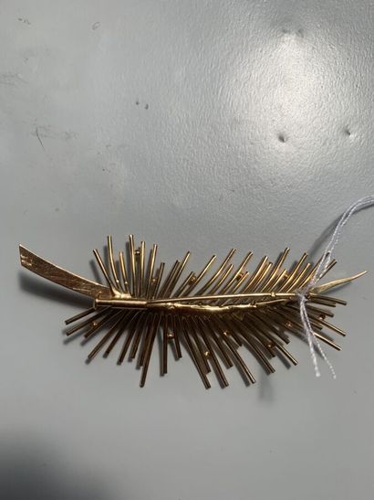 null 2. Palm brooch in yellow gold 750/1000.

Weight : 10.9 g