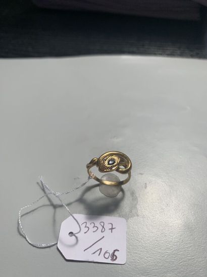 null 42. Ring " Serpent " in yellow gold 750/1000 decorated with a

blue stone and...