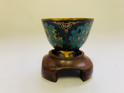 null 
Small bowl in polychrome cloisonné enamel and gold highlights mounted on three...