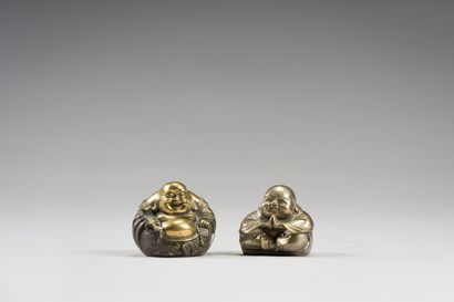 null CHINA 

Lot in bronze, including :

Four Budai statuettes and four luohan statuettes

Dimensions:...