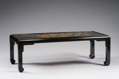 null CHINA 

Black lacquered rectangular coffee table, with polychrome and gold decoration...