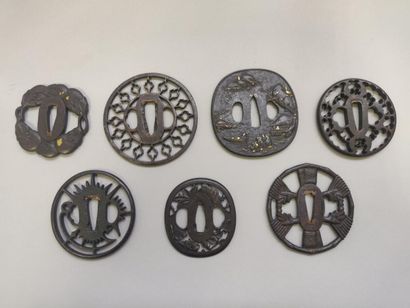 null JAPAN

Set of seven iron tsuba, one of which is gold inlaid and decorated with...