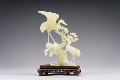 28. Groupe en serpentine
Chine, XXe
 siècle.
Sculpté...