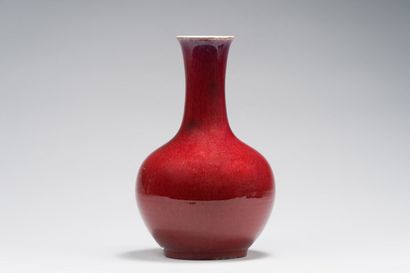 43. CHINA
Bottle vase in red enameled porcelain...