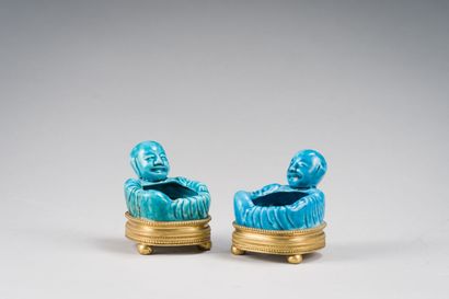 27. CHINA
Pair of turquoise enameled cookie...