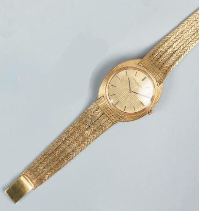AUDEMARS PIGUET Modèle Classic
Années 70.
Montre bracelet en or jaune 18K (750 millièmes),...