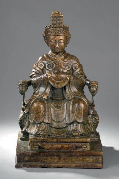 null Épreuve en bronze représentant un Bouddha assis sur son trône à tête de dragon.
Haut.:...