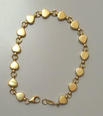 null Bracelet coeur en or jaune 18K (750°/00).
Poids brut: 9,34 g