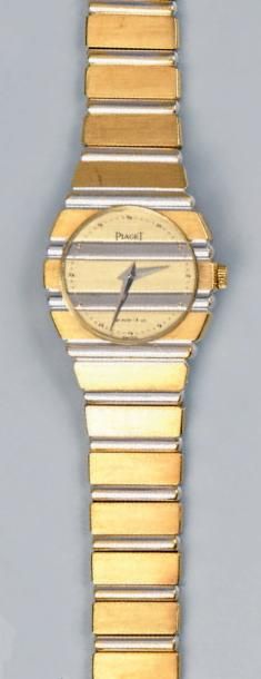 PIAGET Montre bracelet de dame Polo en jaune et gris 18K (750°/00).
Mouvement à quartz.
Poids...
