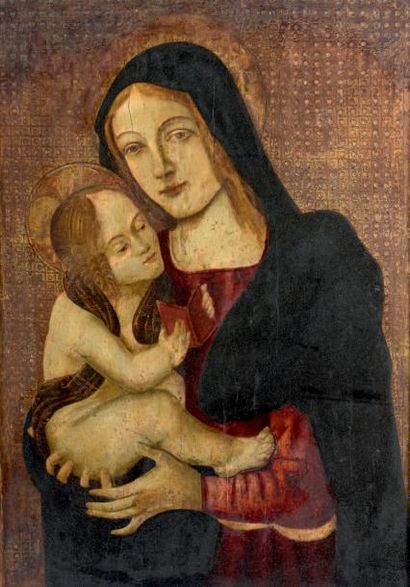 Dans le gout de l'école Ombrienne du XVe siècle *Vierge à l'Enfant
Panneau.
(Restaurations...