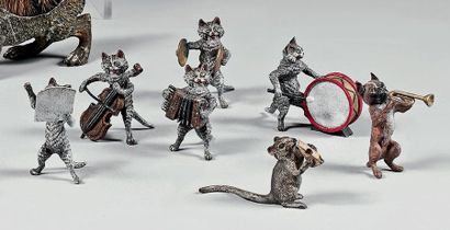 BRONZE DE VIENNE L'orchestre de chats
Six pièces et un rat en bronze et métal peint.
Hauteur:...