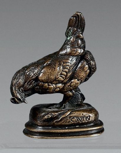 D'après Auguste Nicolas CAIN (1821-1894) 
Poule picorant
Épreuve en bronze à patine...