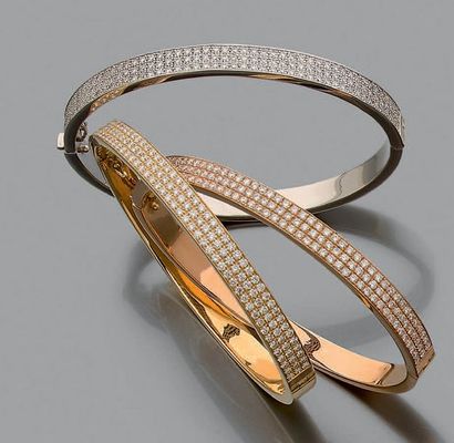 null Ensemble de trois bracelets jonc ouvrant en or jaune, rose et gris 750 millièmes,...