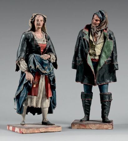 null Couple de santons déguenillés en bois et carton bouilli polychrome.
Début du...