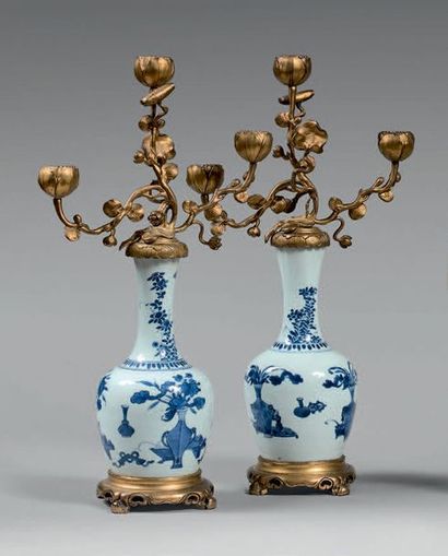 null Pair of Japanese three-light candelabra in the shape of flowers and foliage,...