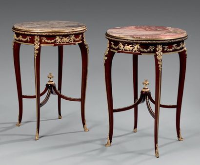 null Pair of mahogany pedestal tables with onyx trays opening on two drawers. Rich...