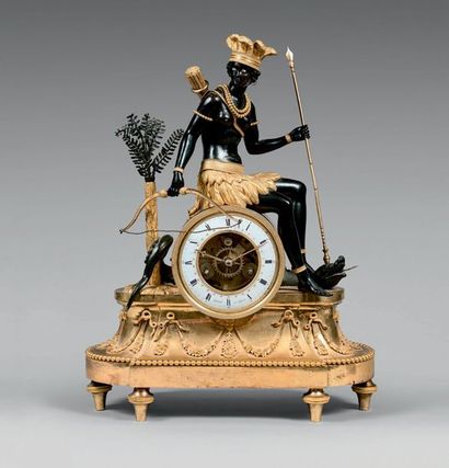 null An "American-style" clock adorned with a patinated bronze Indian huntress sitting...