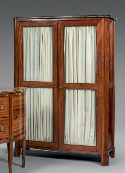 null Small mahogany window opening with two glass doors in two parts. Fluted uprights....