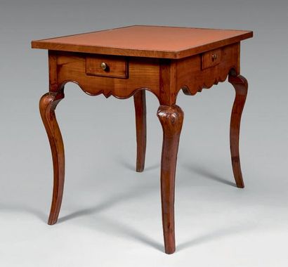 null Cabaret table in fruit wood, opening with four drawers, moving belt. Curved...
