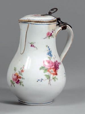 null Baluster jug in hard porcelain, decorated with polychrome flowers. Silver plated...