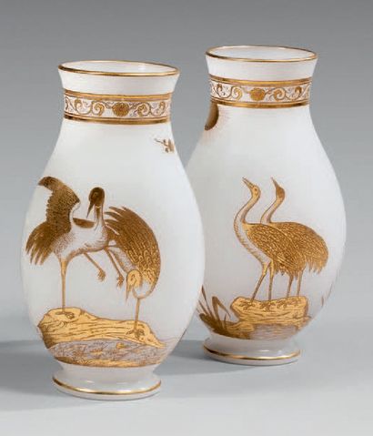 null Pair of flat-bodied ovoid vases in white opaline decorated with a pair of golden...