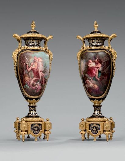 null Pair of very large oval vases covered on porcelain pedestals, decorated with...