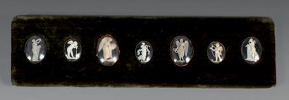 null Seven oval micro-medallions in finely carved ivory representing allegories.
On...