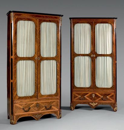 null Pair of rosewood veneer display cases with geometric patterns in light wood,...