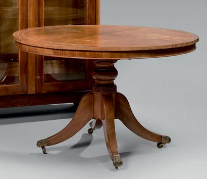 Large pedestal table forming a dining room...
