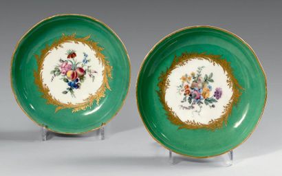 SÈVRES Two round compotiers, polychrome decoration of a bouquet of flowers and fruits...