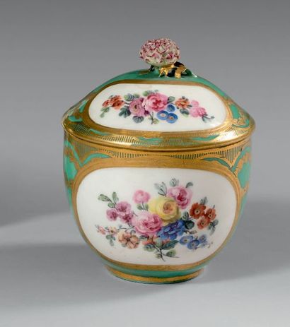 SÈVRES Covered calabrian sugar bowl, polychrome decoration of flowers in oval medallions...