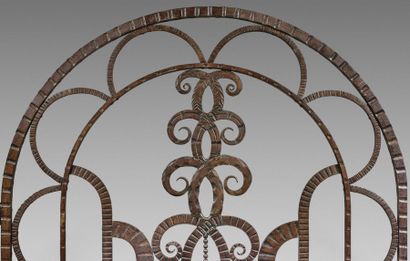 TRAVAIL FRANÇAIS, 1925 
Wrought iron partition door with scroll decoration.
Height:...