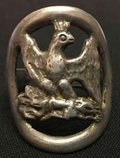 null Ring of grognard, in molten silver showing the imperial eagle on the right on...