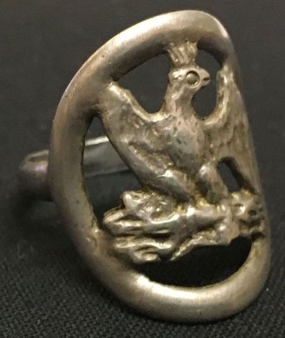 null Ring of grognard, in molten silver showing the imperial eagle on the right on...