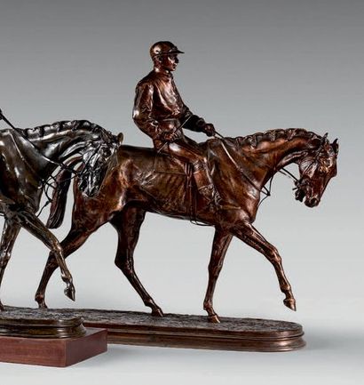 D'APRÈS PIERRE JULES MÈNE Jockey on horseback Bronze
statuette with copper patina.
Base...