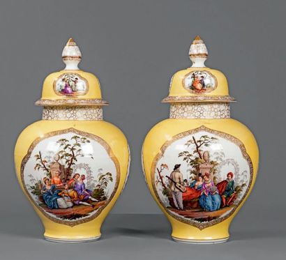 null Pair of large covered German porcelain vases in baluster shape with polychrome...