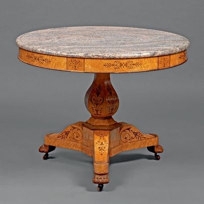 null Pedestal table in speckled maple veneer inlaid with rosewood scrolls and palmettes....