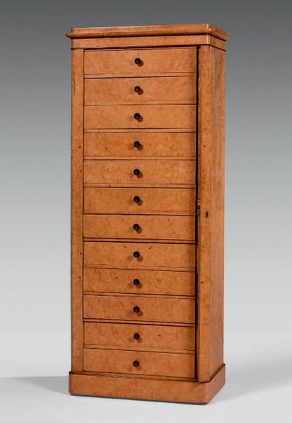 null Ash veneer chest of drawers with twelve drawers with patinated bronze knobs...
