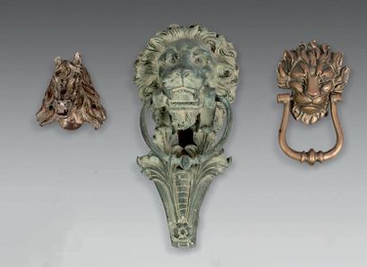 null Bronze door knocker with green patina in the shape of a lion's whelp.
Height:...