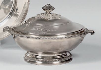 null Silver covered vegetable dish, stylized seed catch. Two leafy handles.
Auteuil,...